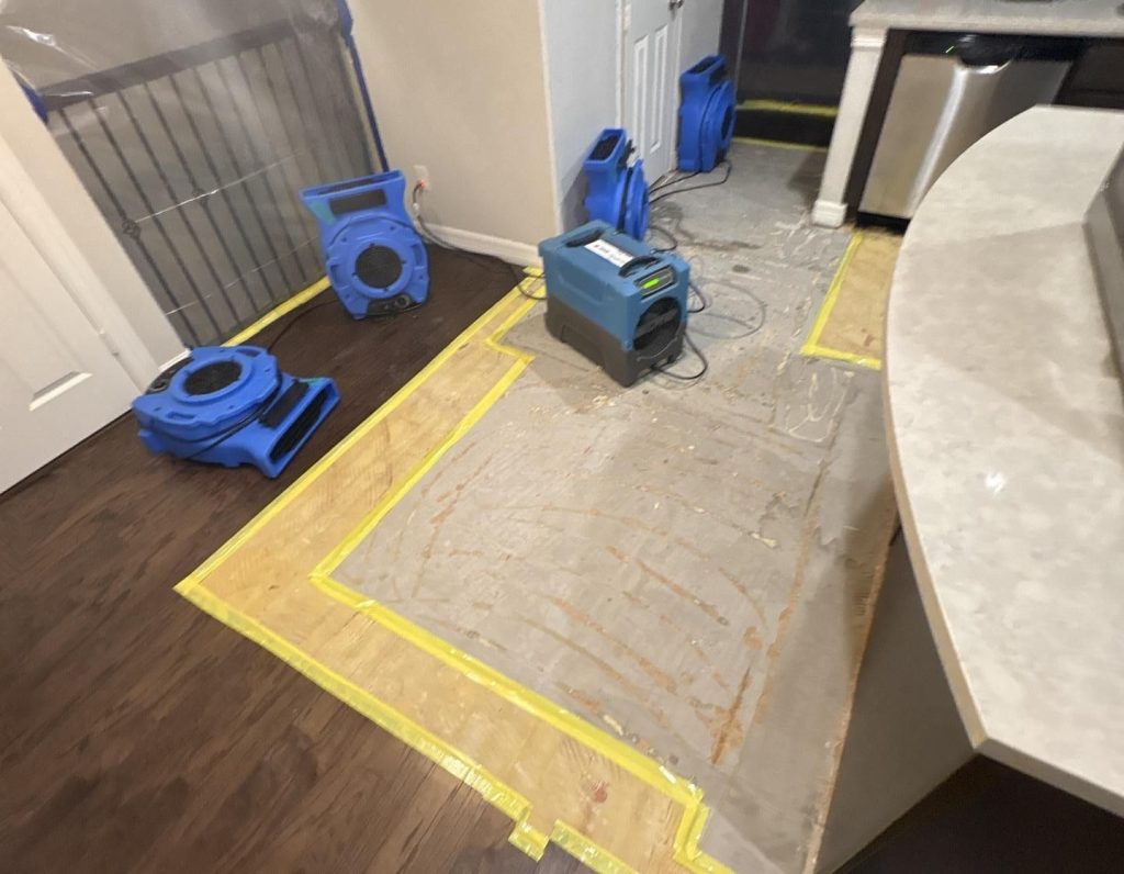 Professional water damage drying equipment set up in a Cypress TX home after flooding