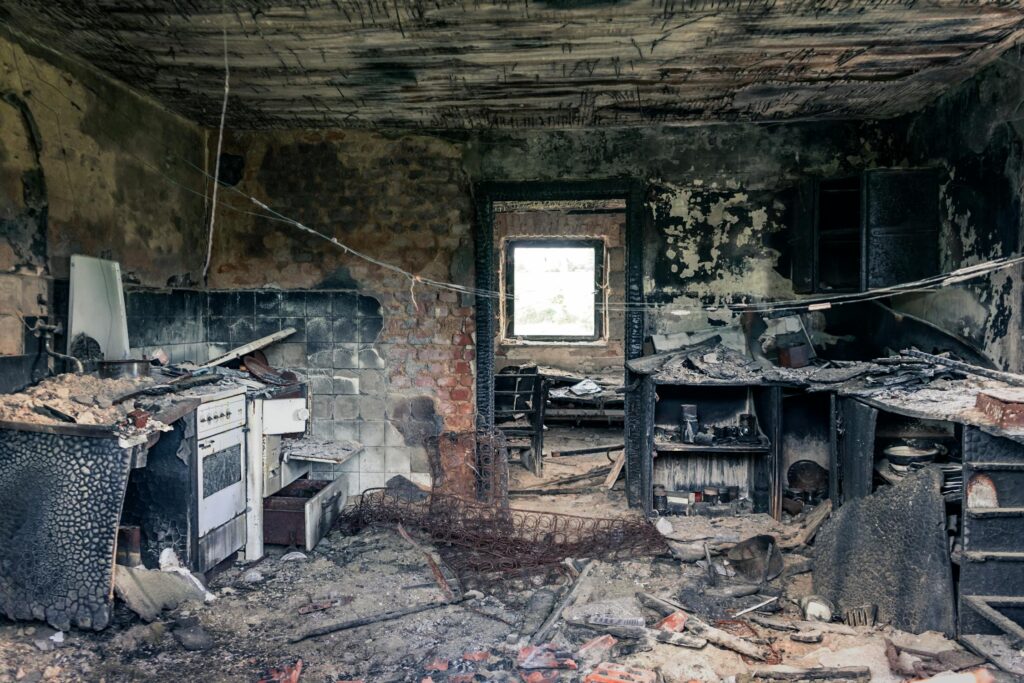 Fire damage restoration in Houston TX showing charred interior after house fire