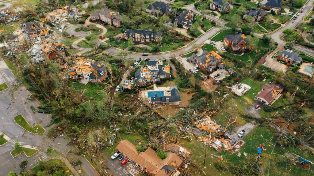 Aerial view of storm and flood damage to Houston TX neighborhood requiring restoration