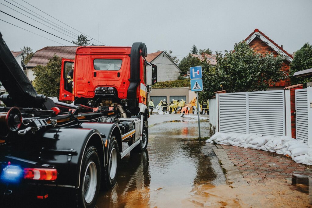 Emergency flood response crew addressing water damage in Houston TX within 24 hours